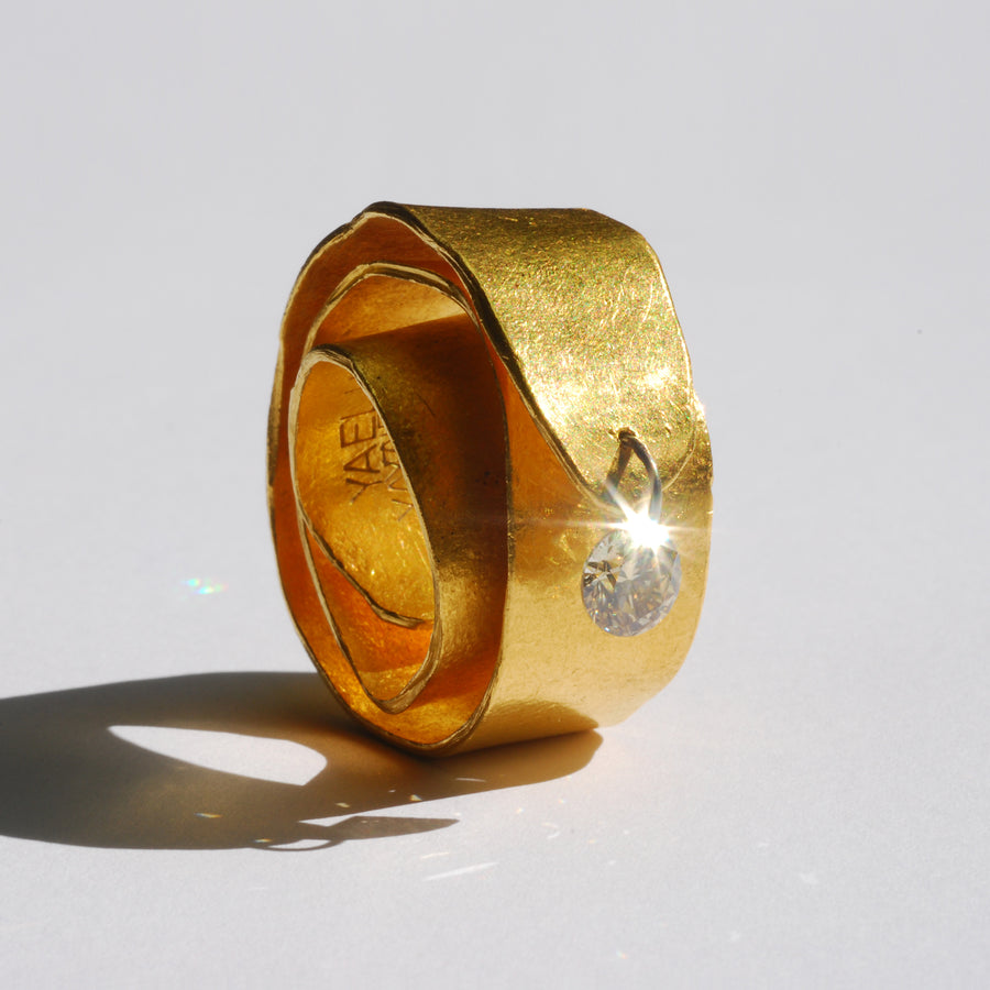 Royal Ring with Pierced Diamond